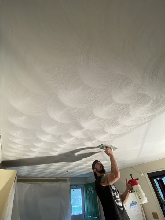 After: Cracked, sagging plaster ceiling replaced with a new swirl plaster ceiling