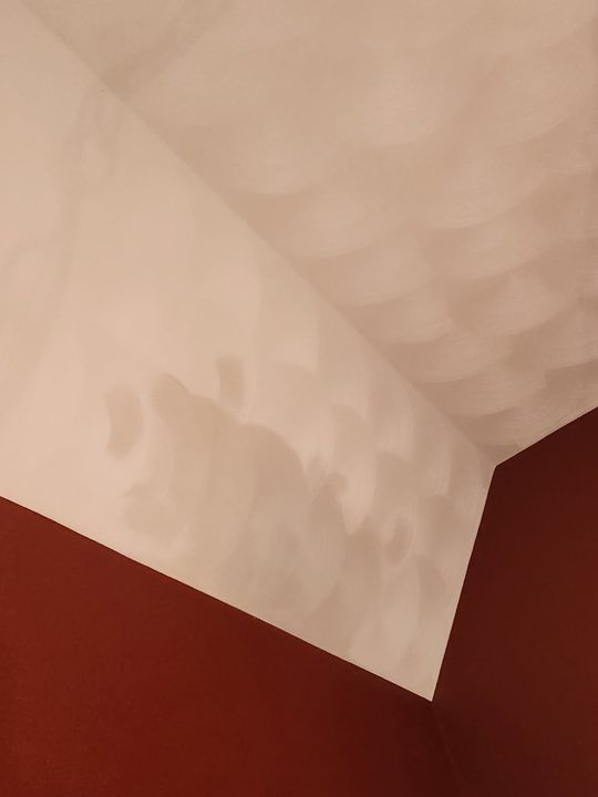 After: Hole through a swirl ceiling, patched and the swirl matched so it disappears